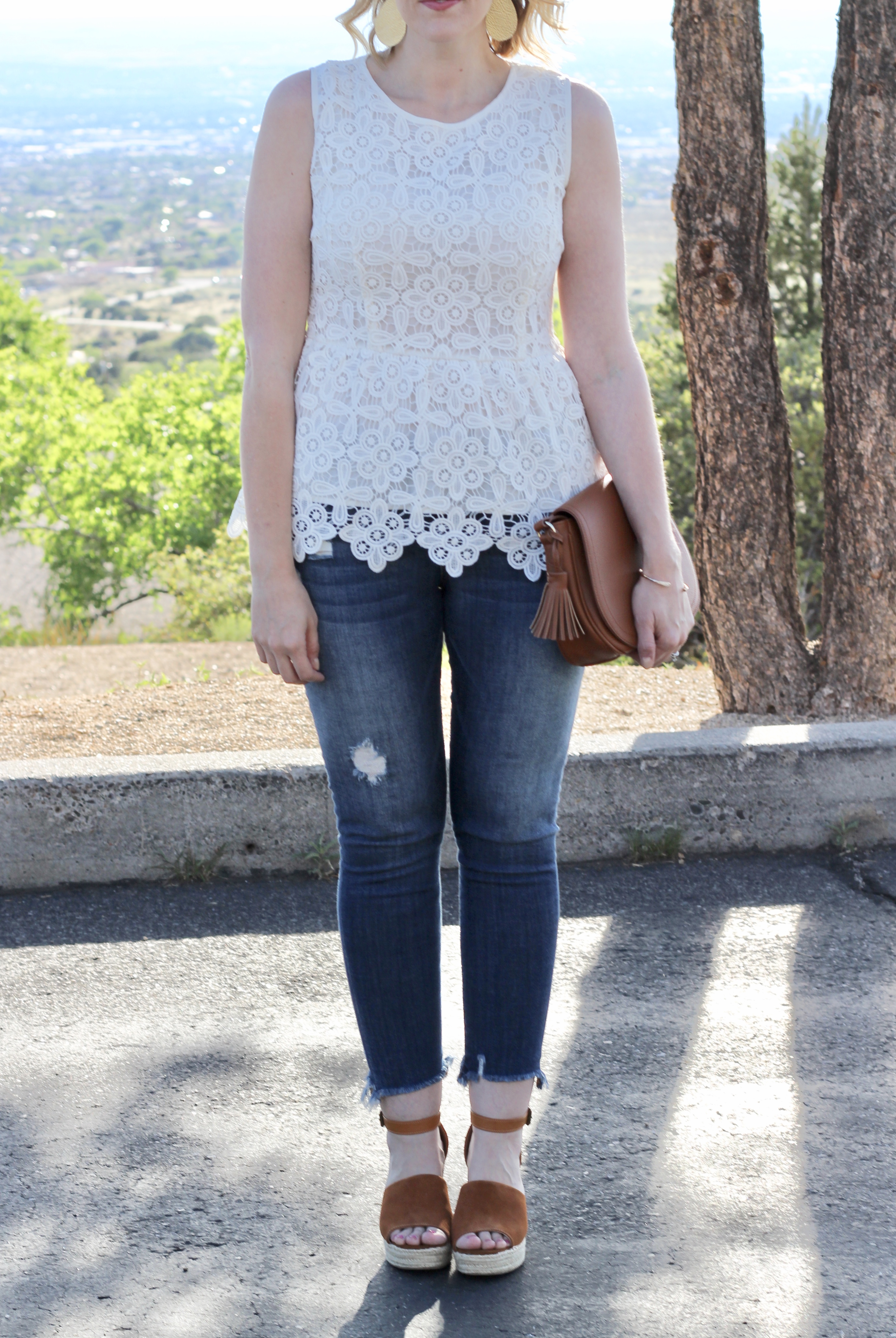 lace peplum top and distressed jeans