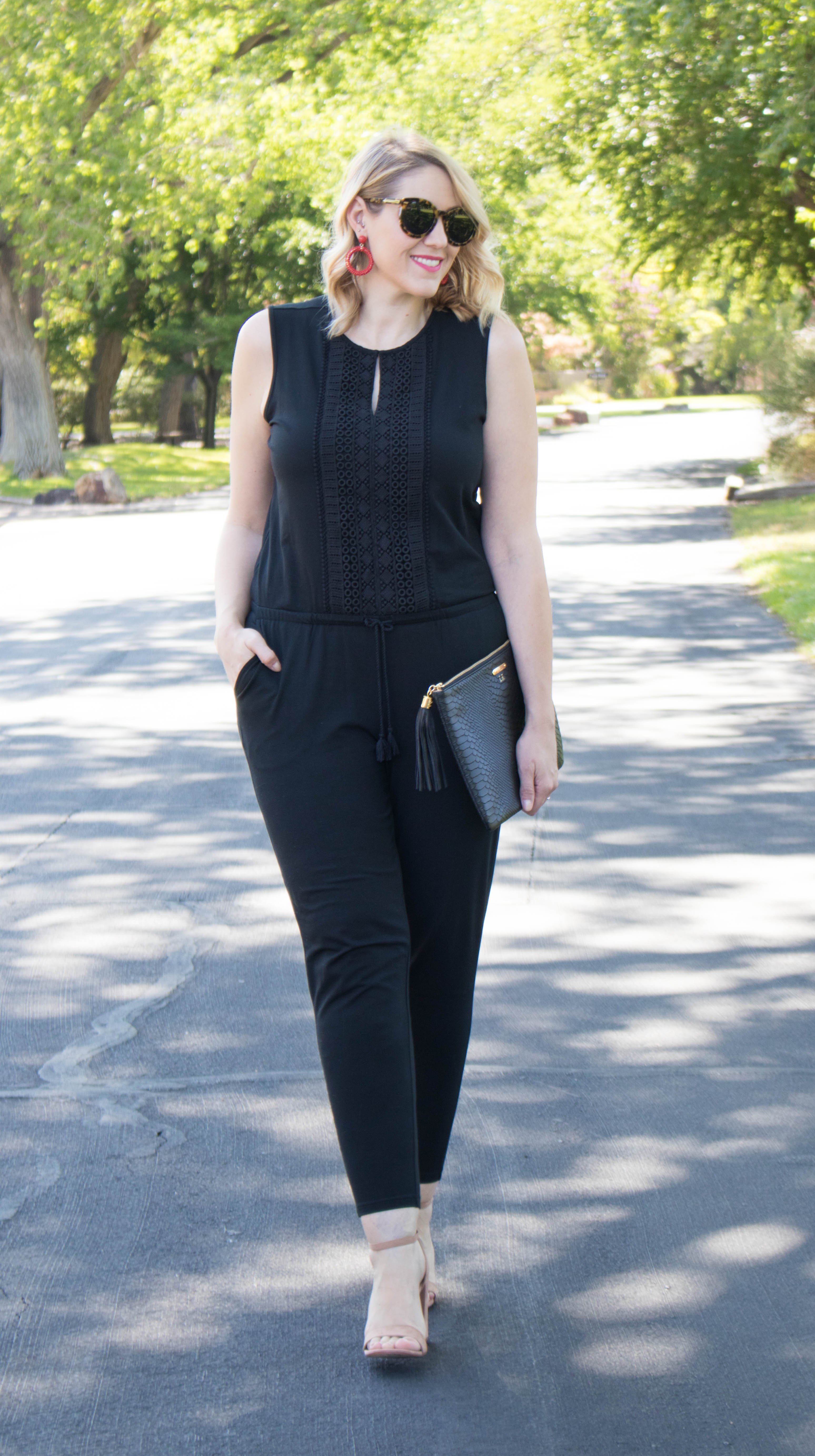 black sleeveless jumpsuit outfit #jumpsuit #fashionblogger #statementearrings