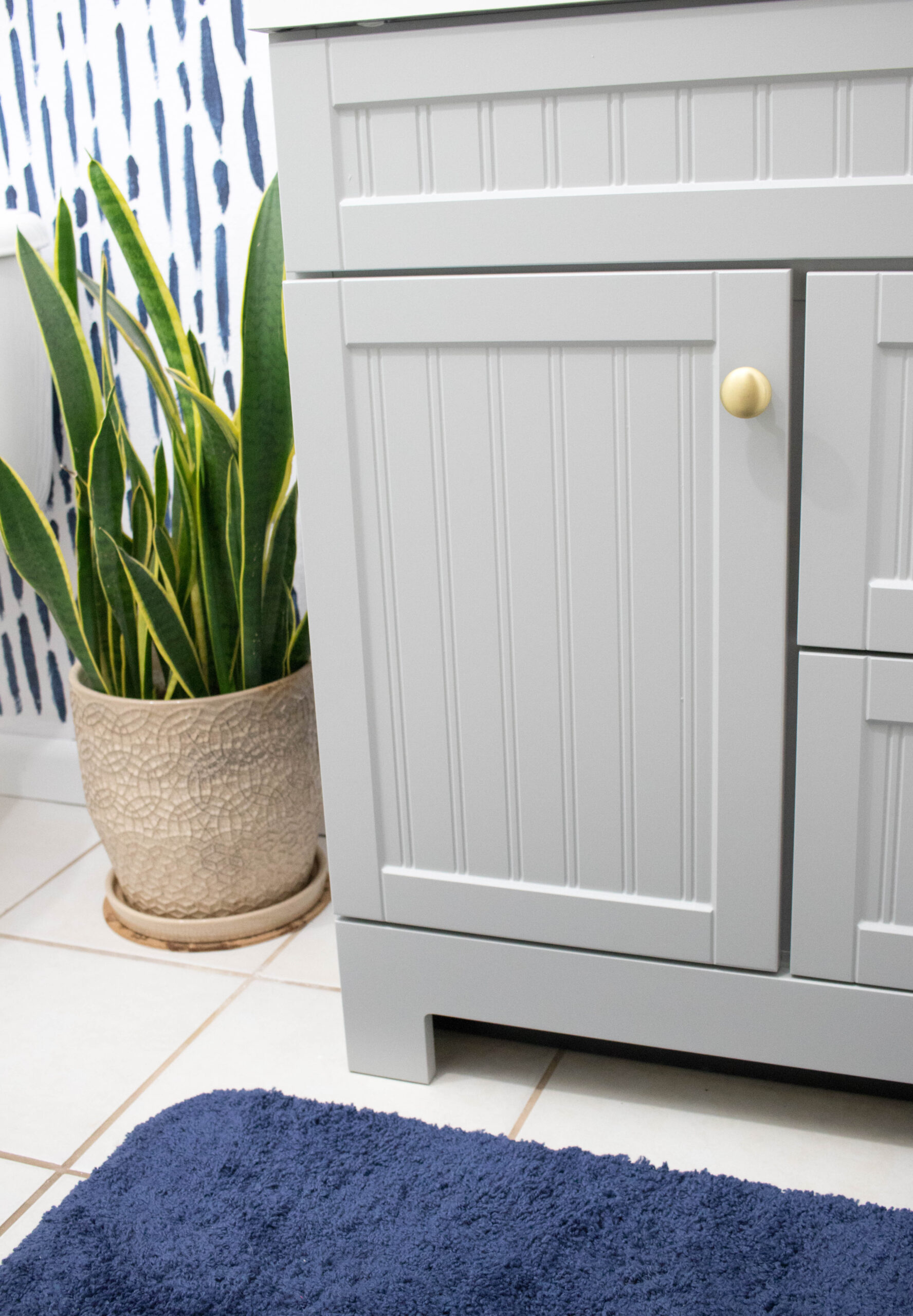 gray bathroom vanity with gold accents #bathroomdecor #bathroomvanity