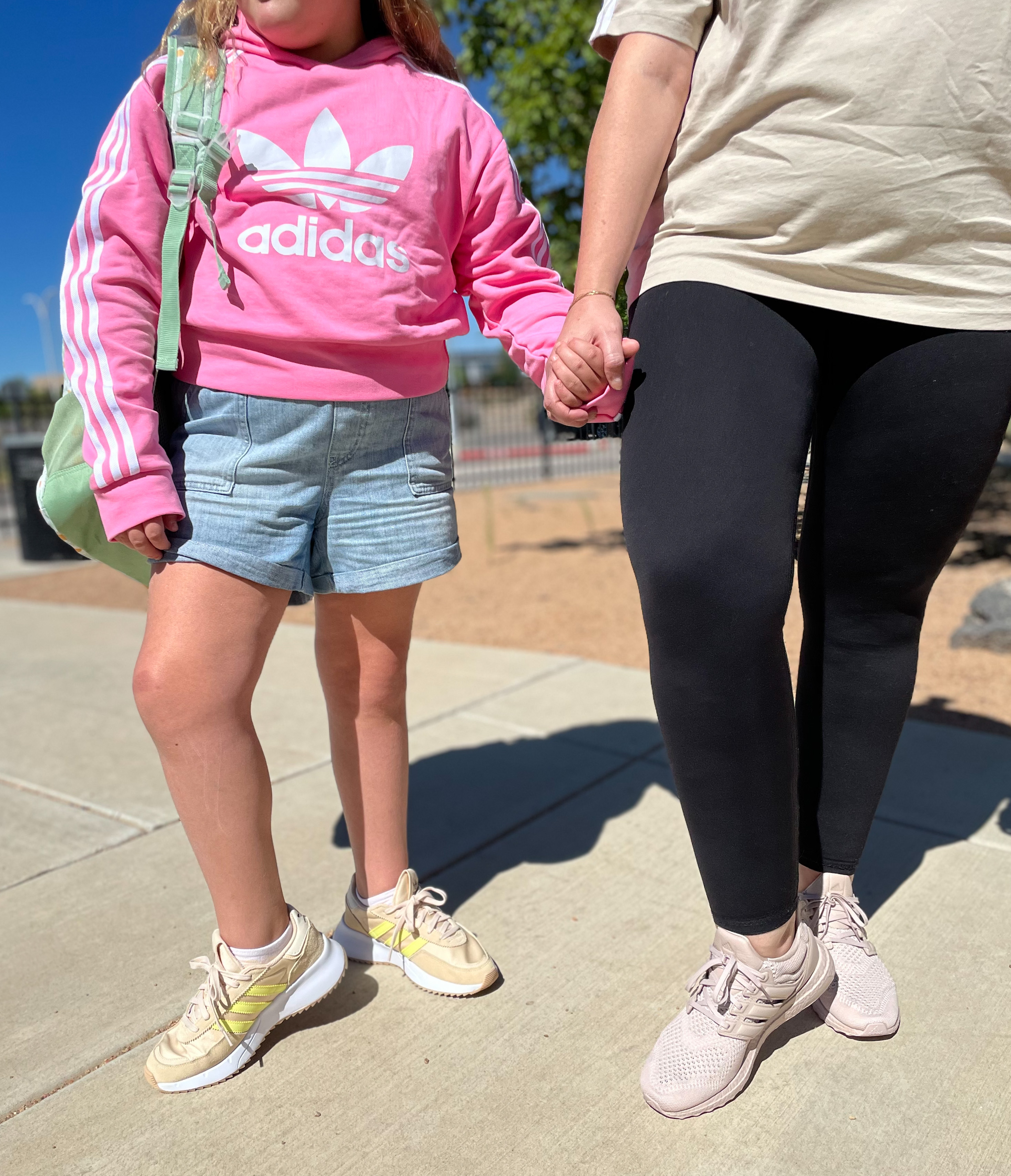 Girls wearing adidas outlet shoes